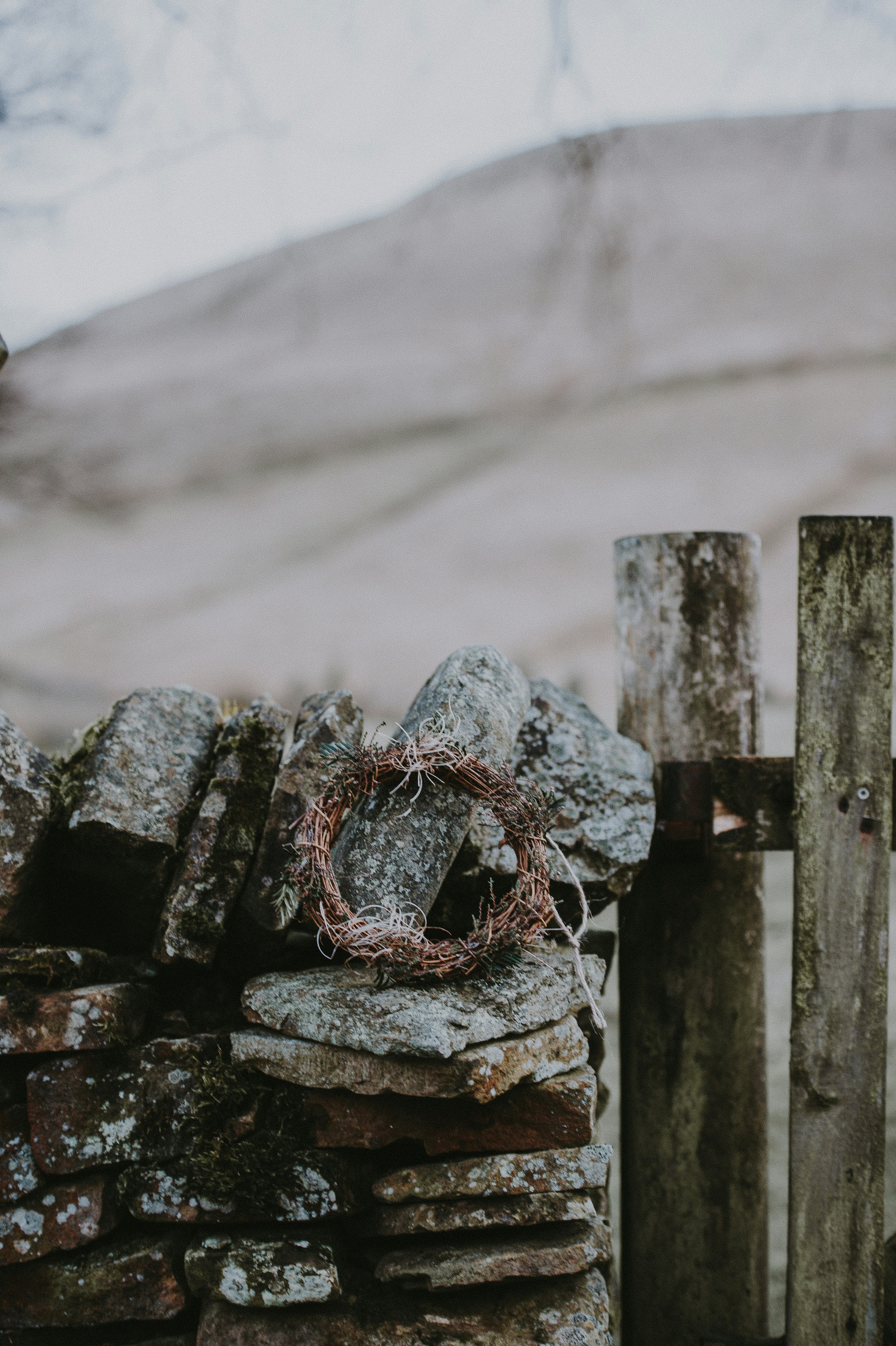 brown wreath on stones